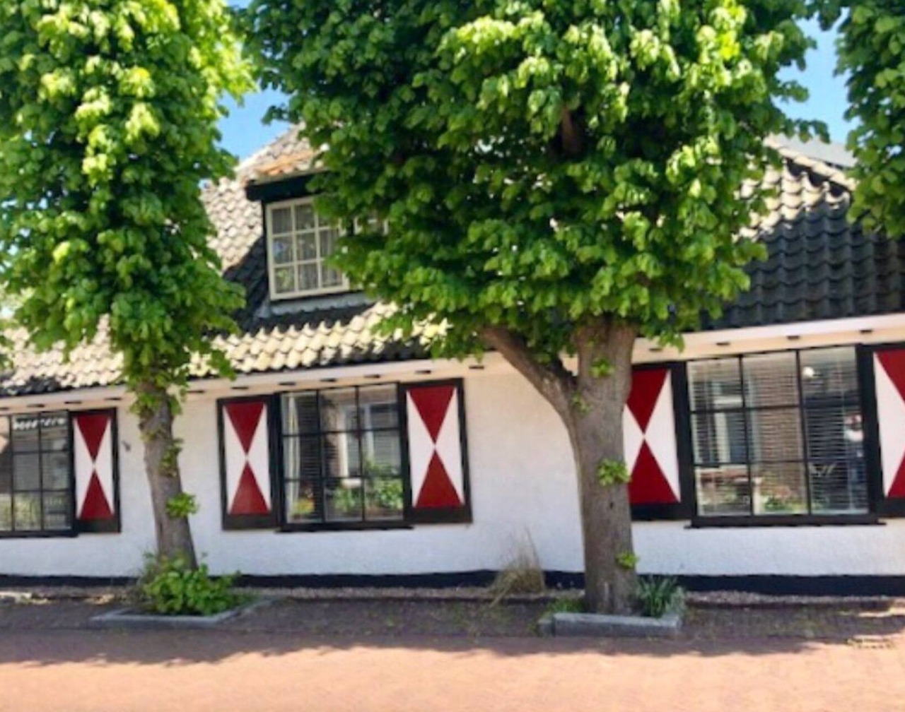 Attractive holiday home in cozy village by the sea and dunes. 1