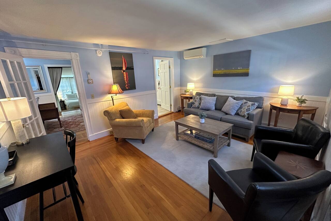Dive into downtown Newport RI in this private, large, unique townhouse-style 2BR apartment at 205 Spring St! King and Full beds + pull-out sofa full kitchen, 2 baths, outdoor patio, AC, TVs, Wifi. Just steps to Thames Street, shops and wharfs 1