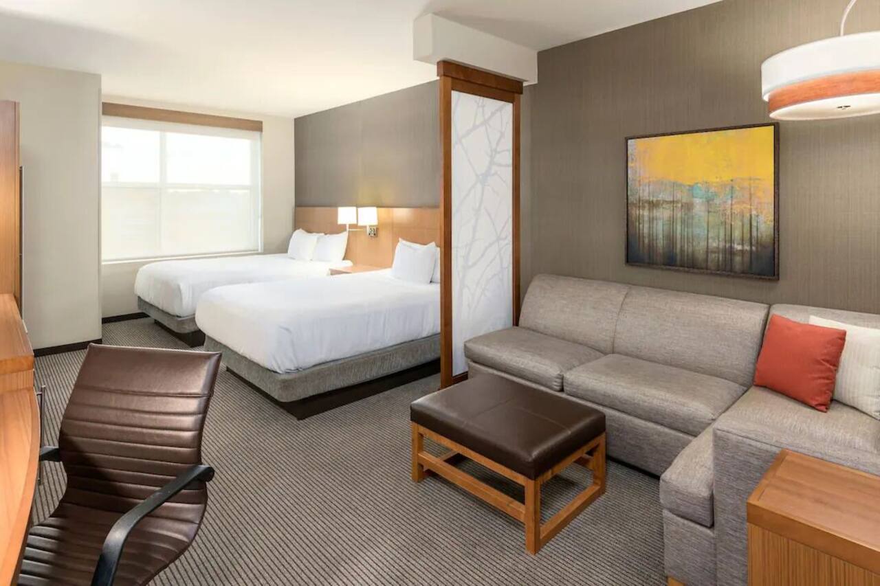 Relaxing 2 Queen Bed Stay Near Peace Center! Onsite Gym and Pool Access! 1