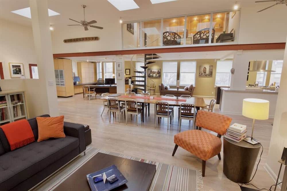 Stunning Art Filled Loft With Abundant Natural Light! 1