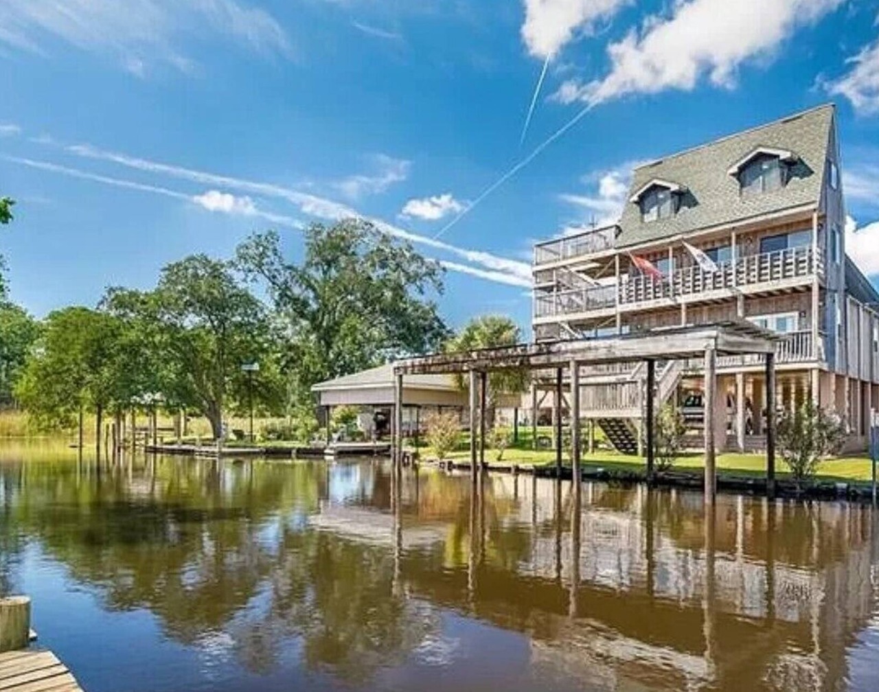 Unique Bayou Waterfront Whimsical home in family neighbor 1