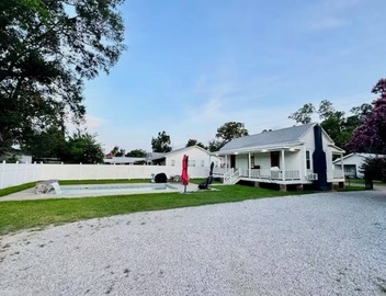Charming 1-bedroom historical cottage in serene Marksville with heated pool. 4