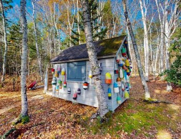 Charming riverfront home with cozy interiors, dock, and scenic deck views 3