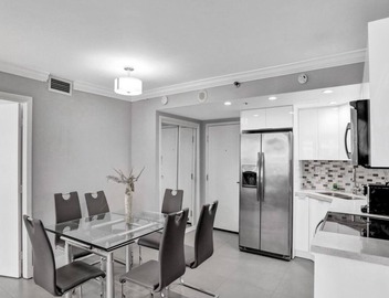 Chic 3 Bedroom Condo by the Sea with Resort Amenities, Pools and Gym 715 3