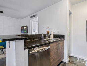 Colorful 1BR 1BA SoCo Condo Pool Skyline Views and Parking by Austin Vacay 5