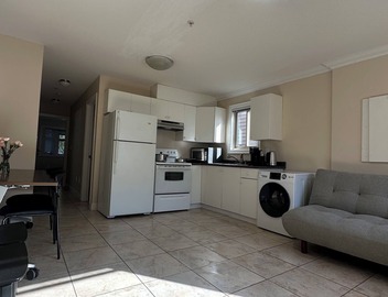 Cozy 2BR in West Side Kitchen & Living 2