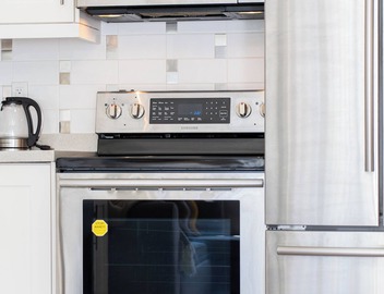 Cozy & Convenient · 2 Mins from SkyTrain · Central Location 4