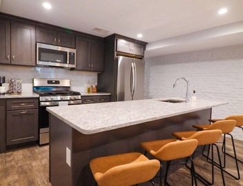 English Basement in Renovated 110 y/o Row Home! 3