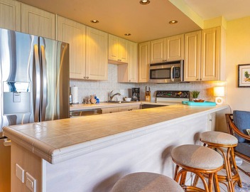 Exceptional Ground Level Retreat: Kihei Surfside #102 – Stunning Pacific Views! 5