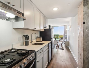 Historic One Bedroom with a Sweeping City View 3