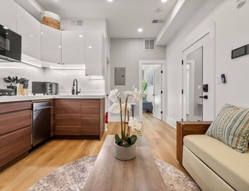 Luxury 1BR: Sleek Kitchen + City Charm | Suite 2 3