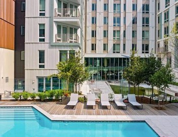 Luxury 2BR Apartment with Pool, Balcony & Parking 3