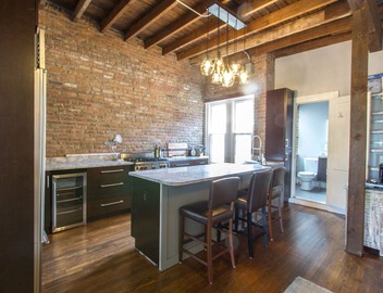 Modern 2-bedroom loft condo near BC, BU, hospitals & train w/parking available. 3