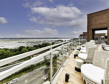 Modern 2BR Oasis with Scenic Rooftop & Gym 2