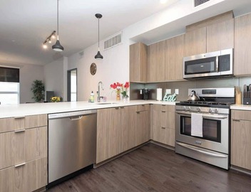 Modern 3BR City Escape | Balcony & Rooftop Pool 2