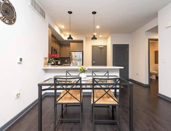 Modern 3BR City Escape | Balcony & Rooftop Pool 3