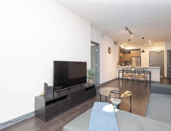 Modern 3BR City Escape | Balcony & Rooftop Pool 4