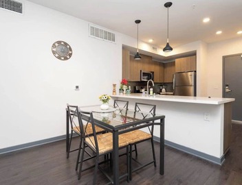 Modern 3BR City Escape | Balcony & Rooftop Pool 5