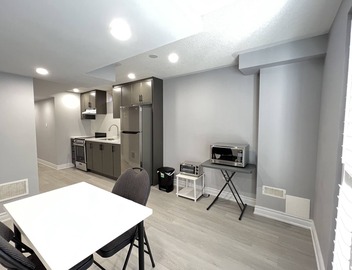 One bedroom ensuite toilet on main level & kitchen, living, bathroom lower level 3