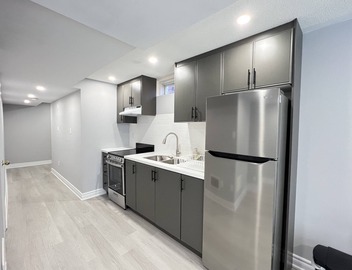One bedroom ensuite toilet on main level & kitchen, living, bathroom lower level 4