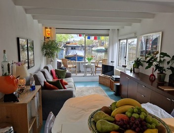 Pantheos Houseboat in Prinsengracht with a view of the Westerkerk the Landmark. 2