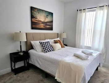 Resort-Style Home in gated community with ammenities close to MCO and Parks! 4