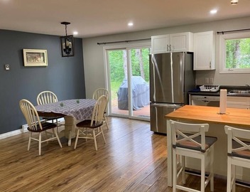 River front 4 season cottage with 2.5 acre serenity with mature trees around 2