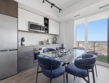 Sleek 2BR Condo with Private Patio & Parking 3