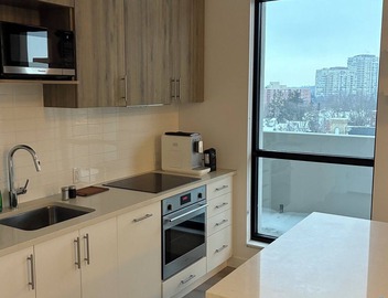 Spacious 2BR + Sofa Bed | Walk to Laurier & Uptown | Free Parking 5
