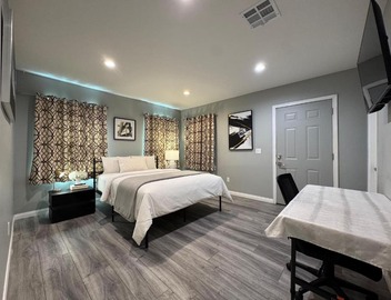 Spacious 3 bedroom unit with backyard and parking just 10 minutes from Rodeo Dr and attractions! 4