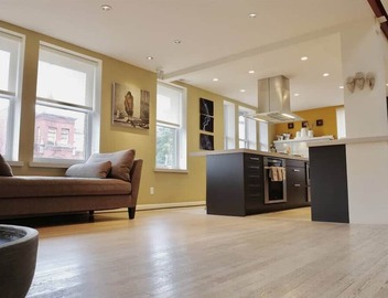 Stunning Art Filled Loft With Abundant Natural Light! 3