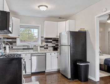 Super Sleek large Tiny house by Westmont Metra large enclosed yard and parking. 4
