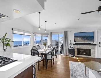 Top Floor Unit with Panoramic Views Steps to the beach with 3 Parking Spots! 2