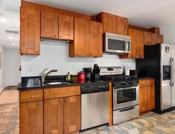 Upscale 2BR Apartment with Patio 2