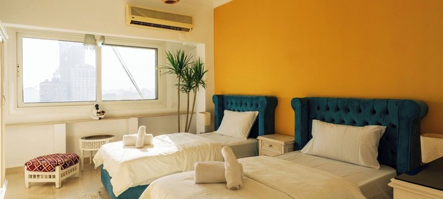 18th floor with Nile and city view I Jacuzzi | Smart-TV I Zamalek