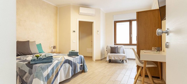 3- Double room, 3 single beds, private bathroom.