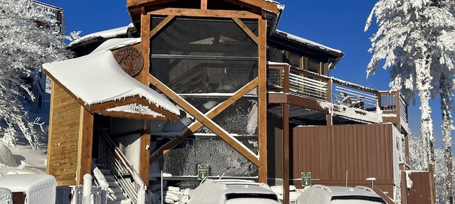 A TRUE slope side ski in ski out cabin with amazing views.