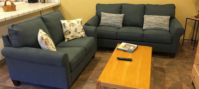 Affordable, end unit on courtyard in desirable La Cabaña! Steps From beach