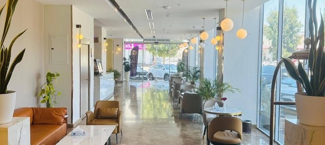 Al Ertiqaa Hotel
