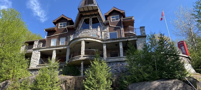 Breathtaking views from rustic cottage atop the Edge of Kennisis Lakes!