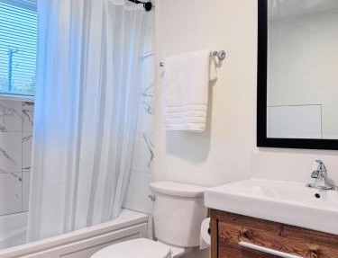 Charming Queen Bedroom with Bathroom Vancouver West