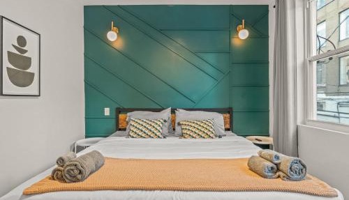 Clean and Comfy King Bed Steps to Fishtown Fun