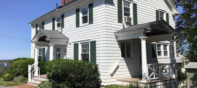 Distinguished classic coastal home overlooks Casco Bay and Maine’s rocky shore!
