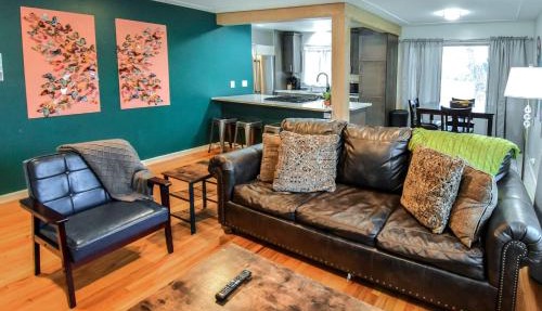 Enchanting Upper Unit with City Charm