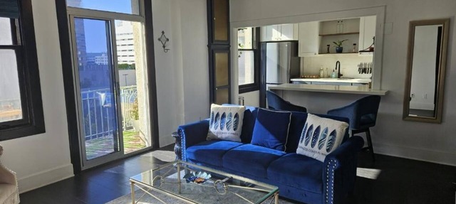 Luxe Suite one bedroom condo with free parking, balcony and partial ocean view.