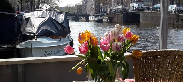Pantheos Houseboat in Prinsengracht with a view of the Westerkerk the Landmark.