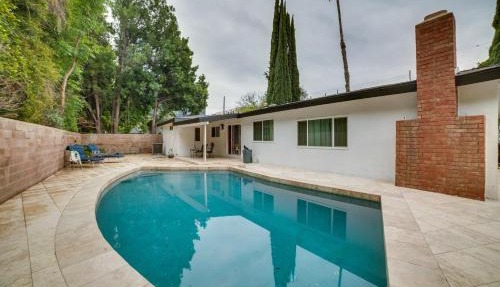 Poolside Relaxation: Luxe Encino Family Getaway!