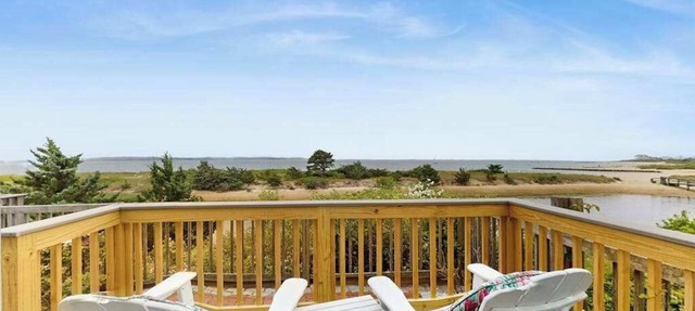 Quintessential coastal studio with beach access, BBQ area, patio, & water views