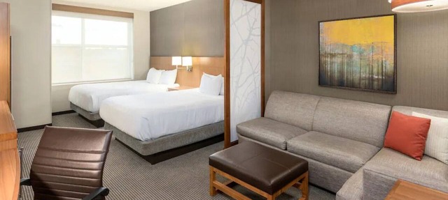 Relaxing 2 Queen Bed Stay Near Peace Center! Onsite Gym and Pool Access!