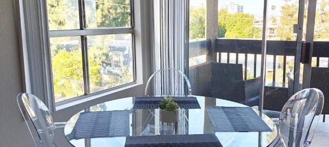 Skyline Escape 1-Bedroom with Balcony and Roof-Top Pool